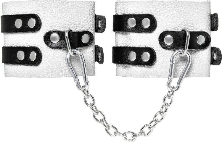 Бело-черные оковы с двумя ремешками и люверсами