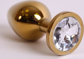 Золотистая анальная пробка с прозрачным кристаллом - 8,2 см.