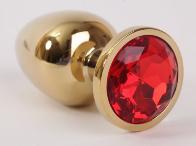 Золотистая анальная пробка с красным кристаллом - 9,5 см.  Цена 2 902 руб. Длина: 9.5 см. Диаметр: 4 см. Металлическая пробка с ограничительным основанием для безопасного использования. Страна: Китай. Материал: металл.