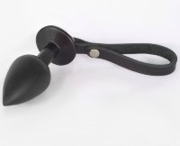 Черная анальная пробка с ремешком - 7 см.