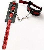 Черные оковы с красным декором и заклепками