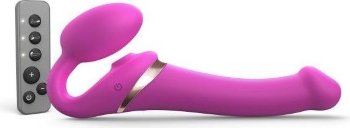 Ярко-розовый безремневой страпон Multi Orgasm Size M с клиторальной стимуляцией