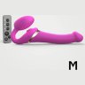Ярко-розовый безремневой страпон Multi Orgasm Size M с клиторальной стимуляцией