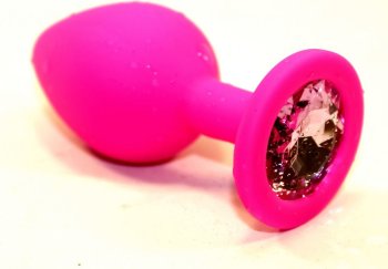 Розовая силиконовая анальная пробка с розовым стразом - 7 см.