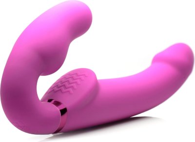 Розовый безремневой страпон с вибрацией и функцией расширения Inflatable Ergo-Fit Strapless Strap-On Длина: 24 см. Диаметр: 3.8 см. Первый в мире безремневой страпон с надувной вагинальной пробкой и пультом дистанционного управления! Он отличается сильной вибрацией и надувной частью, что обеспечивает идеальную посадку на вашем теле. Подушечка с выступами обеспечивает стимуляцию клитора. Для большего удобства пульт дистанционного управления позволяет управлять функцией надувания и мощными двойными моторами. Исследуйте 3 скорости вибрации и 7 моделей пульсации. Длина вагинальной пробки - 10 см, диаметр - 4-5 см. Рабочая длина - 14,6 см. Страна: Китай. Материал: силикон. Батарейки: встроенный аккумулятор.