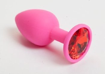 Розовая силиконовая анальная пробка с красным стразом - 7,1 см.