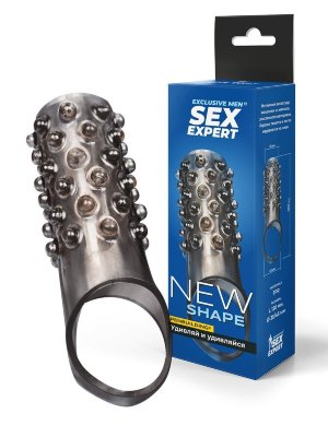 Дымчатая насадка на пенис с выпуклостями - 12 см.  Цена 735 руб. Длина: 12 см. Диаметр: 3.5 см. Оригинальная насадка на пенис с эрекционным кольцом для мошонки и небольшими шипиками внесёт разнообразие в интимную жизнь, сделает её насыщенной и яркой. Эрекционное кольцо на мошонку усилит и продлит эрекцию. Шипики будут дополнительно стимулировать стенки влагалища. Интимный аксессуар хорошо растягивается, подходит для половых членов разных размеров. Может использоваться в сочетании с вибратором или фаллоимитатором. Прост в применении и уходе. Страна: Китай. Материал: термопластичная резина (TPR).