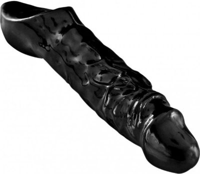 Чёрная увеличивающая насадка на член Mamba Cock Sheath Packaged - 16,5 см. Длина: 16.5 см. Диаметр: 5.08 см. Яркая насадка способная воплотить самые пикантные желания партнёрши. Она без сомнения оценит и хорошо прорисованную головку, и рельефный ствол. Твой член, усиленный этой насадкой, сможет доставать и массировать все её чувствительные точки. Насадка легко надевается, прекрасно держится и позволяет получать потрясающее удовольствие обоим. Сделай секс насыщеннее, интереснее и ярче. Характеристики: Рабочая длина: 16.5 Диаметр: 5 Диаметр кольца: 3.8 Диаметр полости - 3,8 см. Страна: США. Материал: термопластичная резина (TPR).