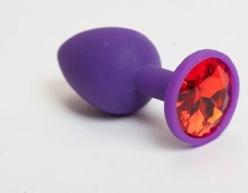 Фиолетовая силиконовая анальная пробка с красным стразом - 7,1 см.