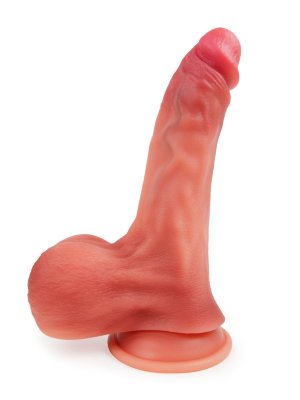 Телесный силиконовый фаллоимитатор на присоске - 23 см.  Цена 7 895 руб. Длина: 23 см. Диаметр: 5 см. Потрясающий фаллоимитатор для тех, кто предпочитает максимально реалистичные секс-игрушки. Ярко выраженная головка, объёмный ствол, внушительная мошонка притягивают и разжигают желание. Рельефная поверхность с «пульсирующими» венками усиливает возбуждение. Изогнутая форма позволяет стимулировать точку G.Фаллоимитатор гнётся в разные стороны, что существенно расширяет возможности его использования. Подходит для различных видов интимной близости и всевозможных поз. Широкая присоска надёжно фиксирует секс-игрушку на ровной поверхности. Благодаря мягкому материалу интимный аксессуар можно мять, сжимать и скручивать. Изделие просто в использовании, не требует специального ухода. Рабочая длина - 16 см. Страна: Китай. Материал: силикон.